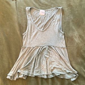 Teal tank top, very light material. Great for a beach day!